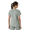 Blusa médica de cuello en V con paneles de punto Force Essentials para mujer