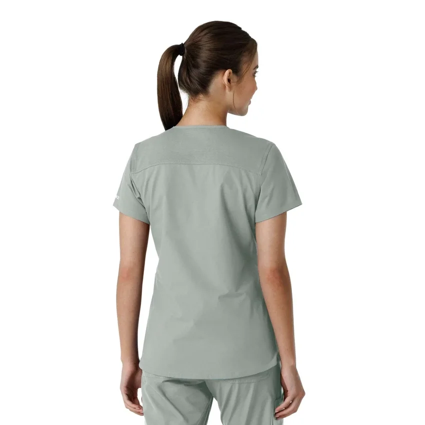 Blusa médica de cuello en V con paneles de punto Force Essentials para mujer