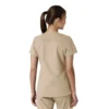 Blusa médica de cuello en V con paneles de punto Force Essentials para mujer