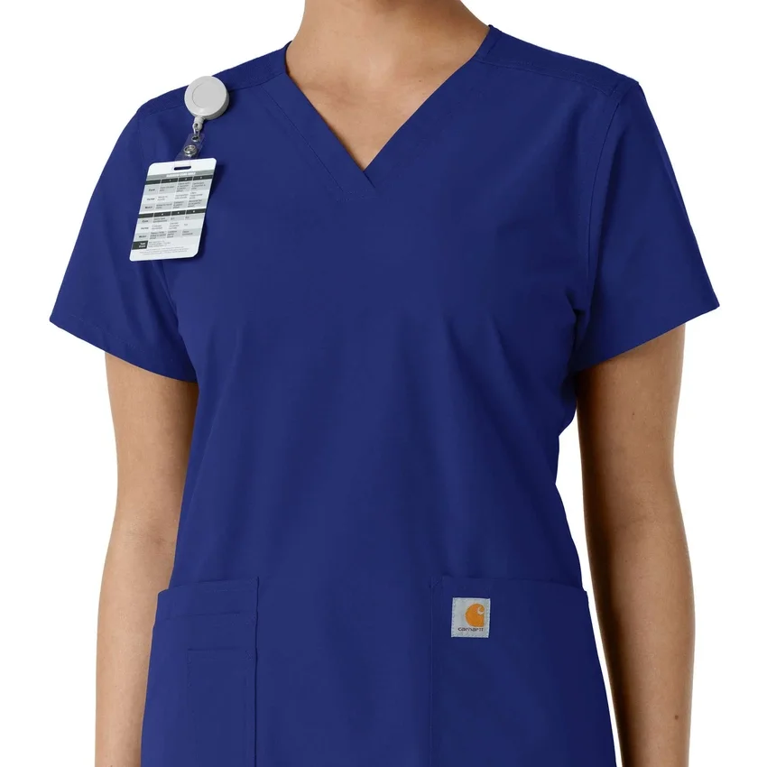 Blusa médica de cuello en V con paneles de punto Force Essentials para mujer