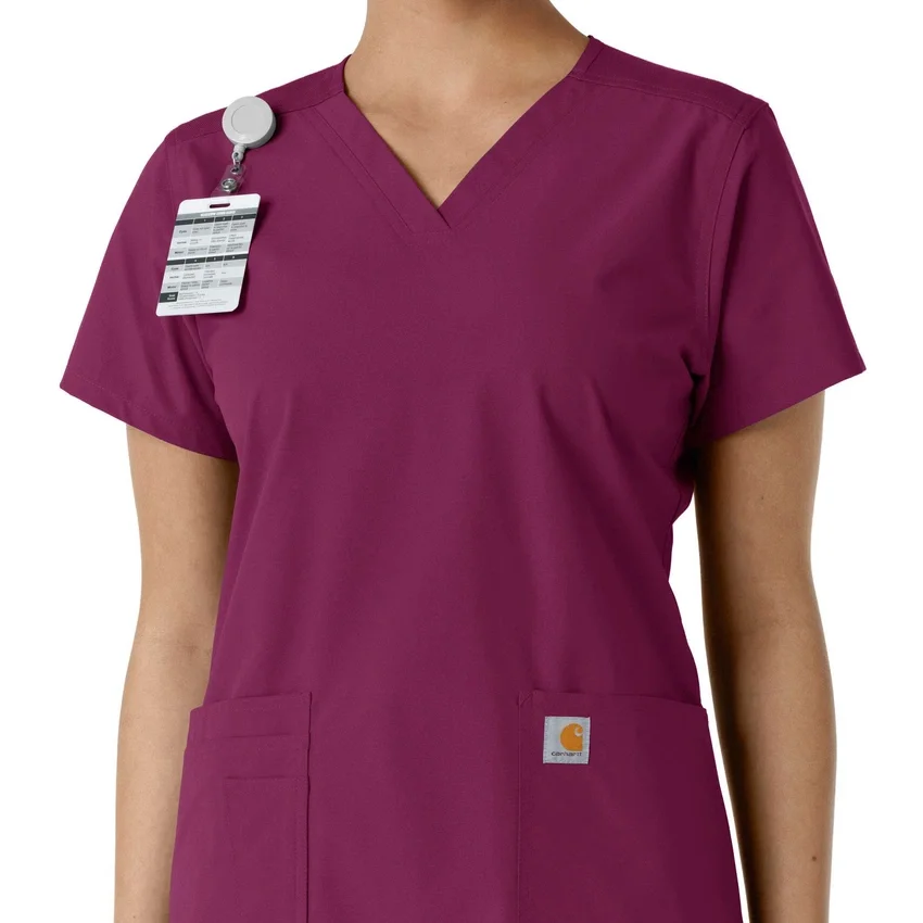 Blusa médica de cuello en V con paneles de punto Force Essentials para mujer