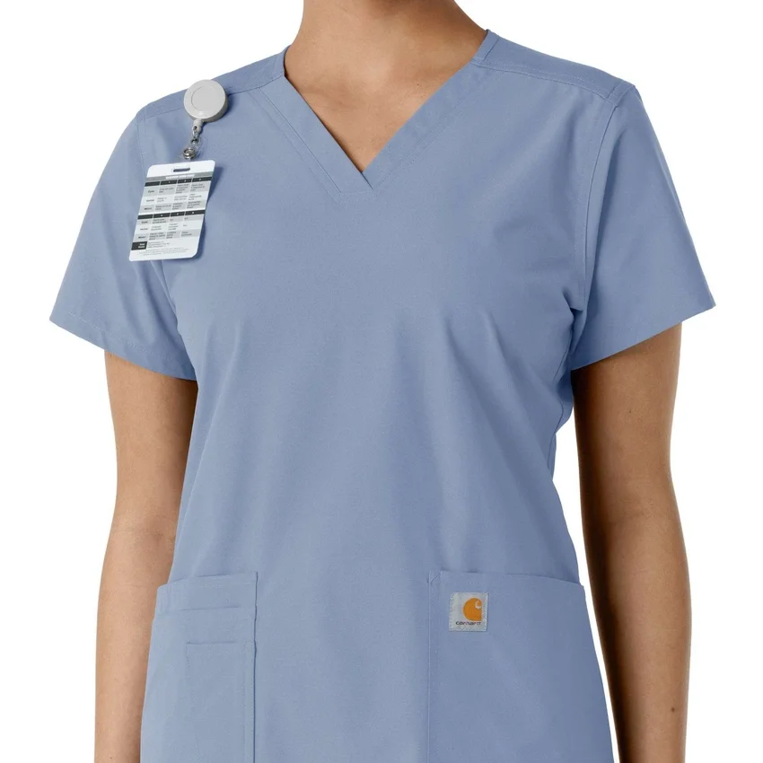 Blusa médica de cuello en V con paneles de punto Force Essentials para mujer