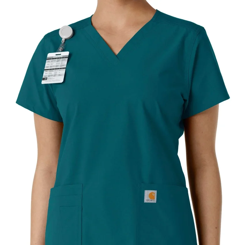 Blusa médica de cuello en V con paneles de punto Force Essentials para mujer