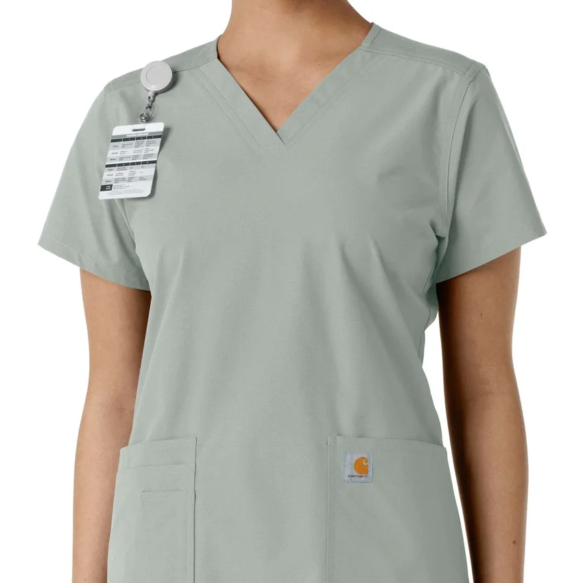 Blusa médica de cuello en V con paneles de punto Force Essentials para mujer