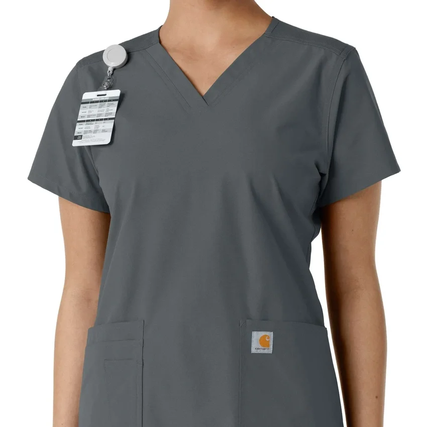 Blusa médica de cuello en V con paneles de punto Force Essentials para mujer