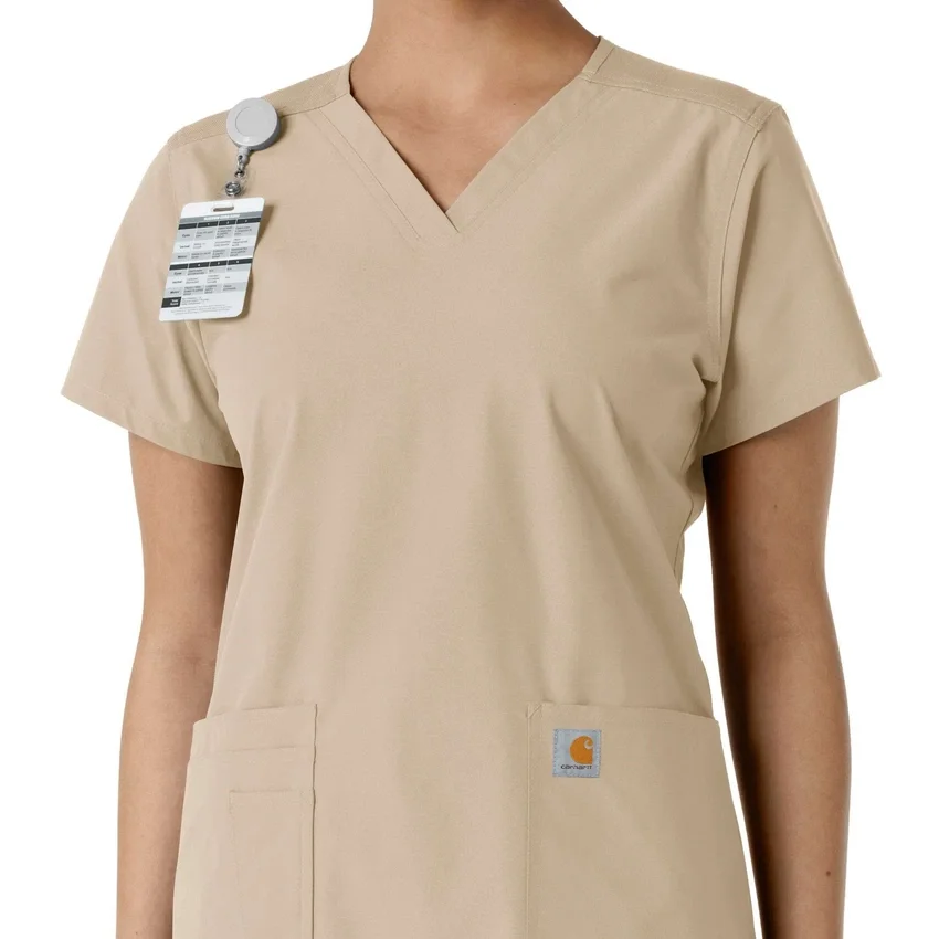 Blusa médica de cuello en V con paneles de punto Force Essentials para mujer