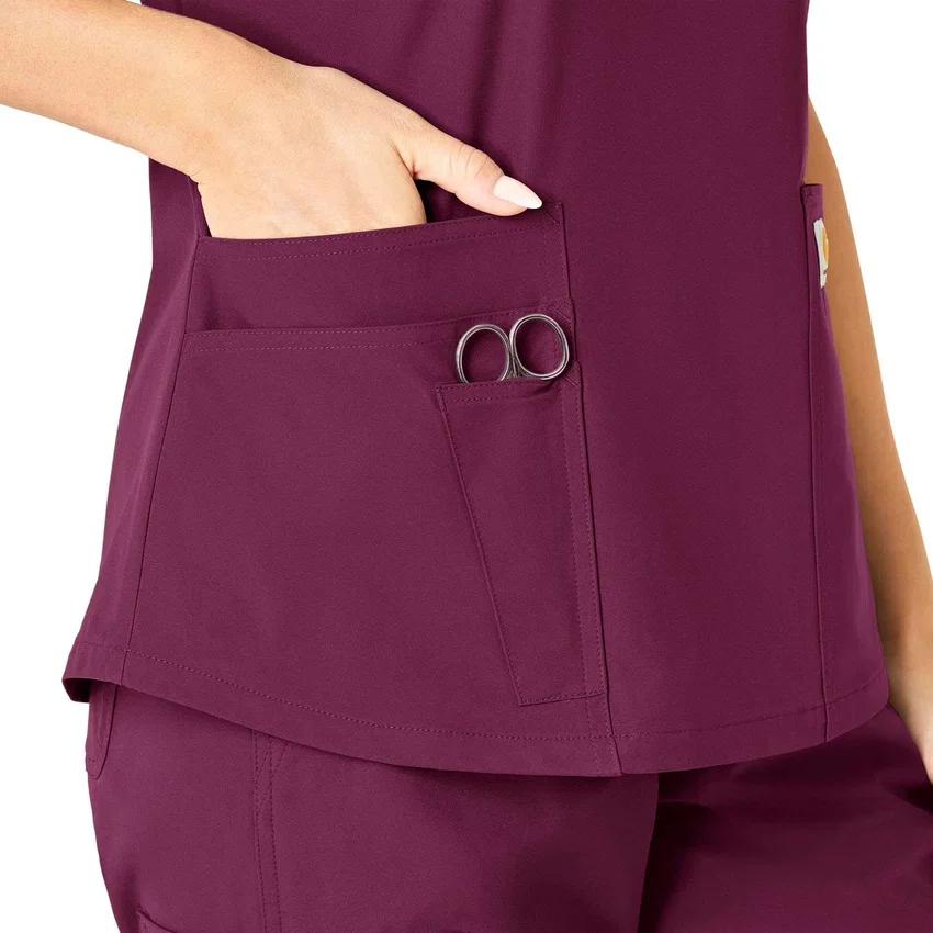 Blusa médica Force Essentials con cuello en V para mujer