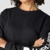 Camiseta de manguitos largos con logo «Dearborn» de corte holgado y tejido grueso para mujer