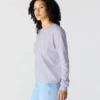 Camiseta de mujer de Tencel, corte holgado, manguitos largos, cuello redondo y bolsillo