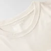 Camiseta de mujer de Tencel, corte holgado, manguitos largos, cuello redondo y bolsillo