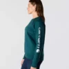 Sudadera cuello redondo con estampado gráfico, corte holgado y peso medio para mujer