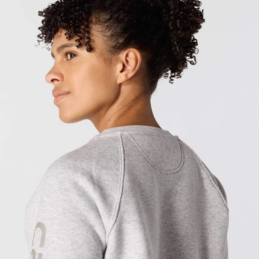 Sudadera cuello redondo con estampado gráfico, corte holgado y peso medio para mujer